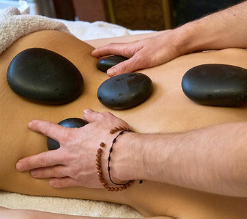 Caractéristiques du massage aux pierres chaudes à Bordeaux
